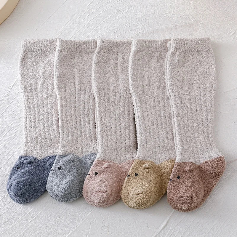 SnugKnee – Coral Fleece Knee-High Baby Socks 🧦❄️