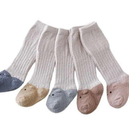 SnugKnee – Coral Fleece Knee-High Baby Socks 🧦❄️